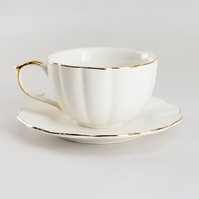 DUNCAN BQ SM TEA CUP AND SAUCER