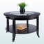 Table basse circulaire à quatre pieds Sienna