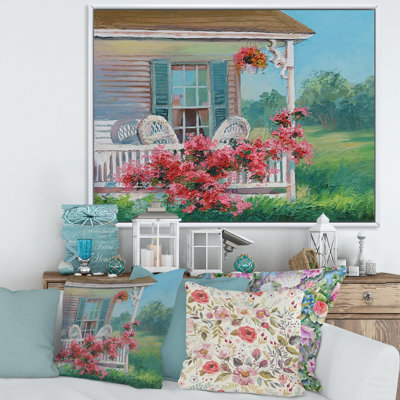 Maison en bois avec patio et fleurs rouges en fleurs - Peinture sur toile