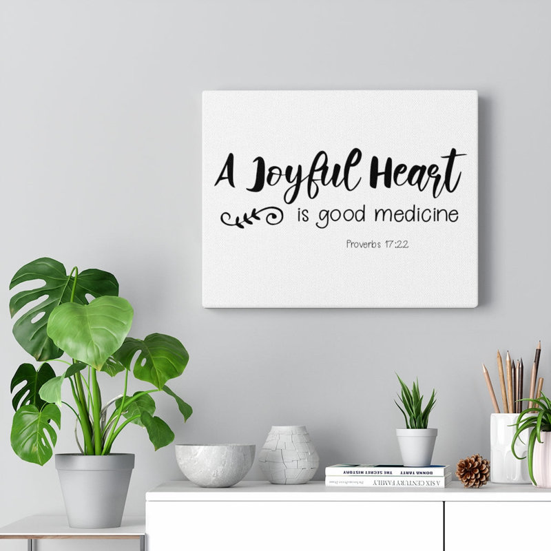 A Joyful Heart Proverbs 17:22 - Wrapped Canvas Print, 61cm H x 76cm W
