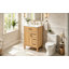 Meuble-lavabo 24 po avec lavabo en céramique, armoire traditionnelle moderne, panneau de fibres à densité moyenne avec pieds en bois massif, 1 porte, 1 tiroir rabattable et 3 tiroirs, poignées noires
