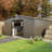 Durable Metal Sheds With Sunlit Windows, Modern Backyard Storage Solution