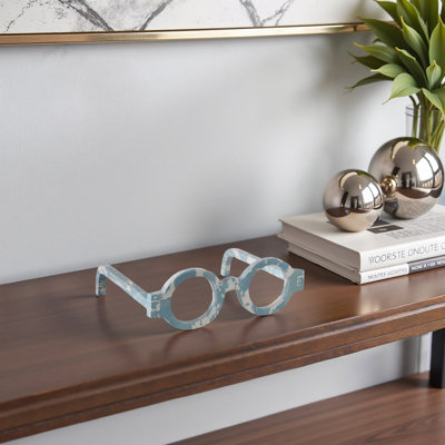 Objets décoratifs en pierre en forme de lunettes avec motif sculptural