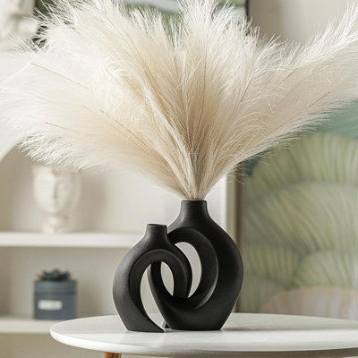 Nestled In A Hollow Ceramic Vase