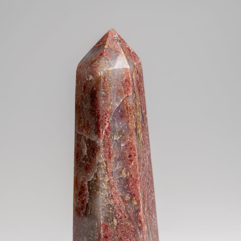 Véritable pointe de rhodonite impériale polie (1,4 lb)