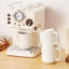 Ensemble de grandes tasses en céramique blanche 4 pièces avec rebord courbé architectural | Grandes tasses à café 16 oz, design moderne-122829694