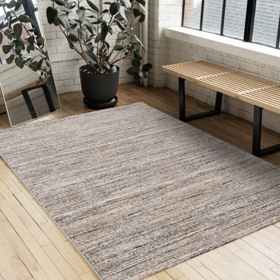 Tapis abstrait gris, beige, blanc, neutre et très fréquenté