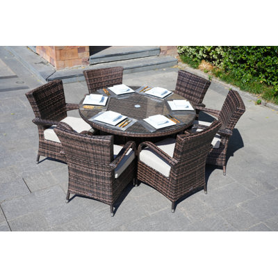 Therasa 6 - Person Patio Dining Set with Round Table , Cushions Included