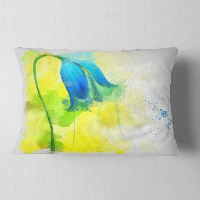 Coussin à imprimé floral bleu avec éclaboussures jaunes