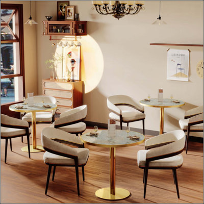 Table bistro tulipe ronde et moderne avec plateau en faux marbre, structure en métal robuste et facile à assembler