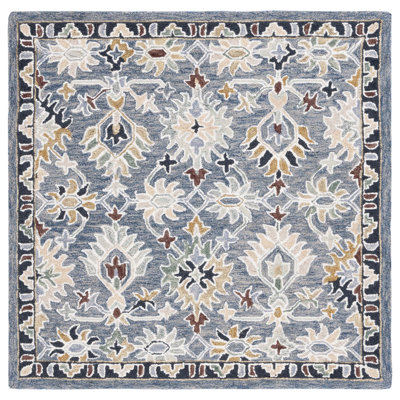 Oriental Hand Tufted Wool/Cotton Area Rug in White/Blue