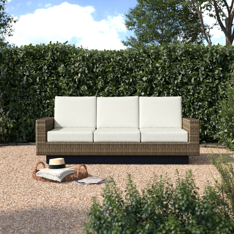Arlette Wicker Outdoor Sofa with Sunbrella Cushions