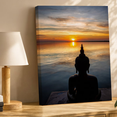 Toile, silhouette sereine d'un Bouddha assis contre un art mural Coucher de soleil vibrant capturant l'essence de la tranquillité, art mural