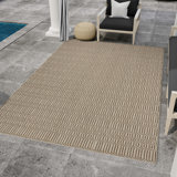 Nautica Geometric Indoor / Outdoor Area Rug in Brown