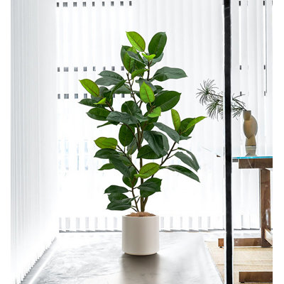 Luxueux et minimaliste arbre artificiel d'intérieur en pot