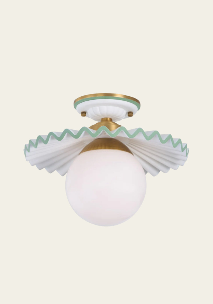 Close-up of a white and gold ceiling light.