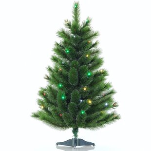 The Remote Controlled Height Adjustable Christmas Tree - Hammacher Schlemmer