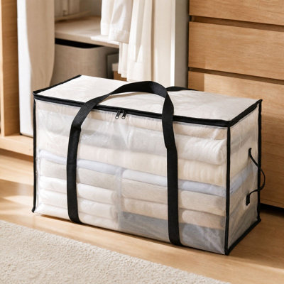 Sac de rangement transparent à poches avec poignées de transport et fermeture éclair. Grande capacité pour la literie, les vêtements et l'organisation du déménagement. Disponible en trois tailles.