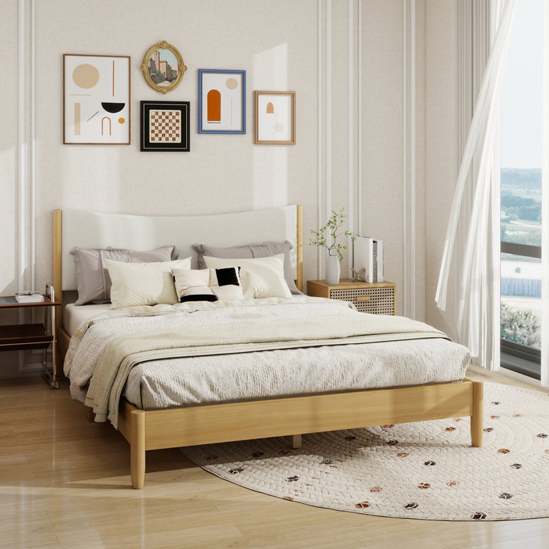 Grand lit en bois d'hévéa massif avec tête de lit rembourrée en velours Teddy, rehaussé de pieds de soutien