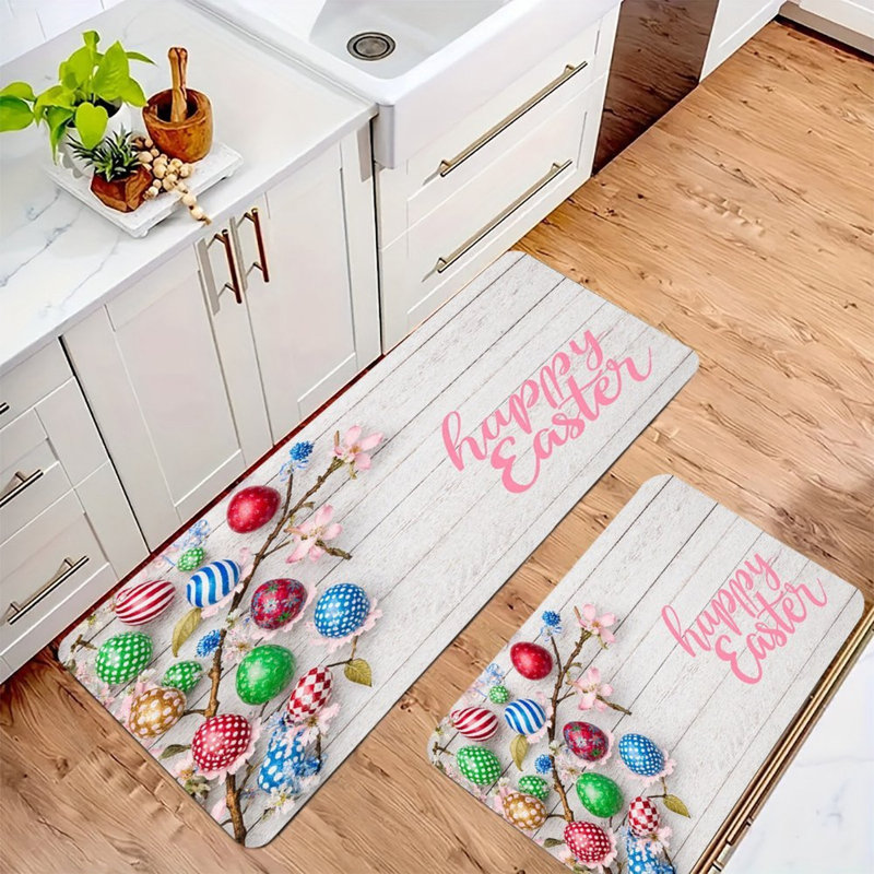 Ensemble de 2 œufs de Pâques colorés et tapis de cuisine colorés