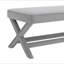 Double banc Comfort recouvert de tissu de velours, tabouret avec pieds élégants en X, coussin Comfort avec passepoil, velours