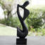 Man and Sax Wood Statue