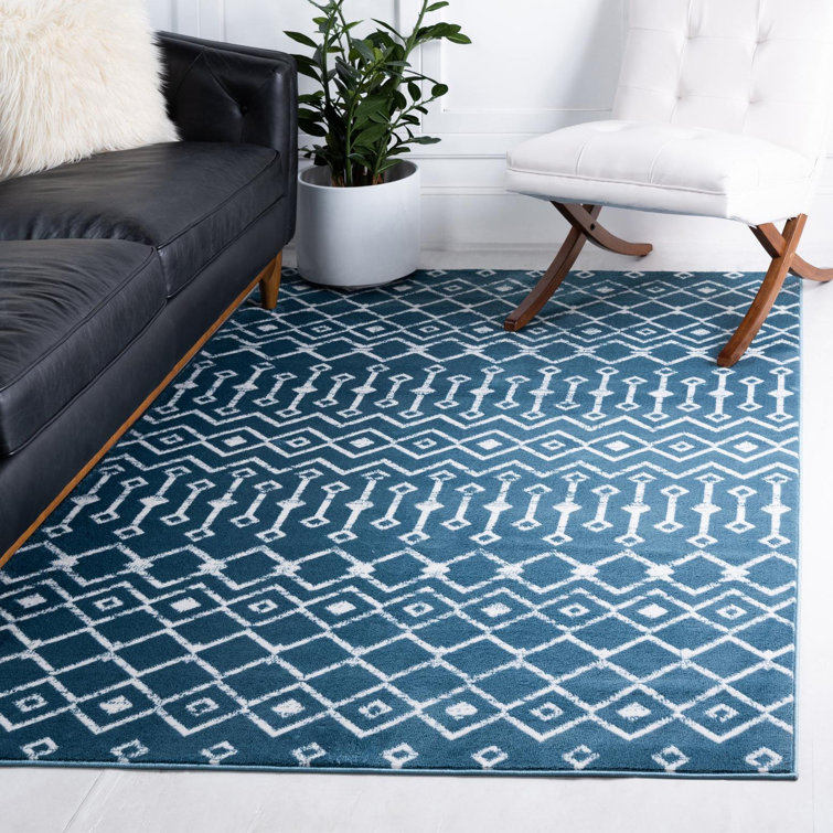 Tapis géométrique bleu foncé World Menagerie