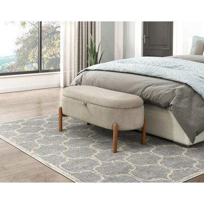 Banc de rangement avec siège rembourré en velours côtelé taupe et pieds relevables en bois massif 1pc