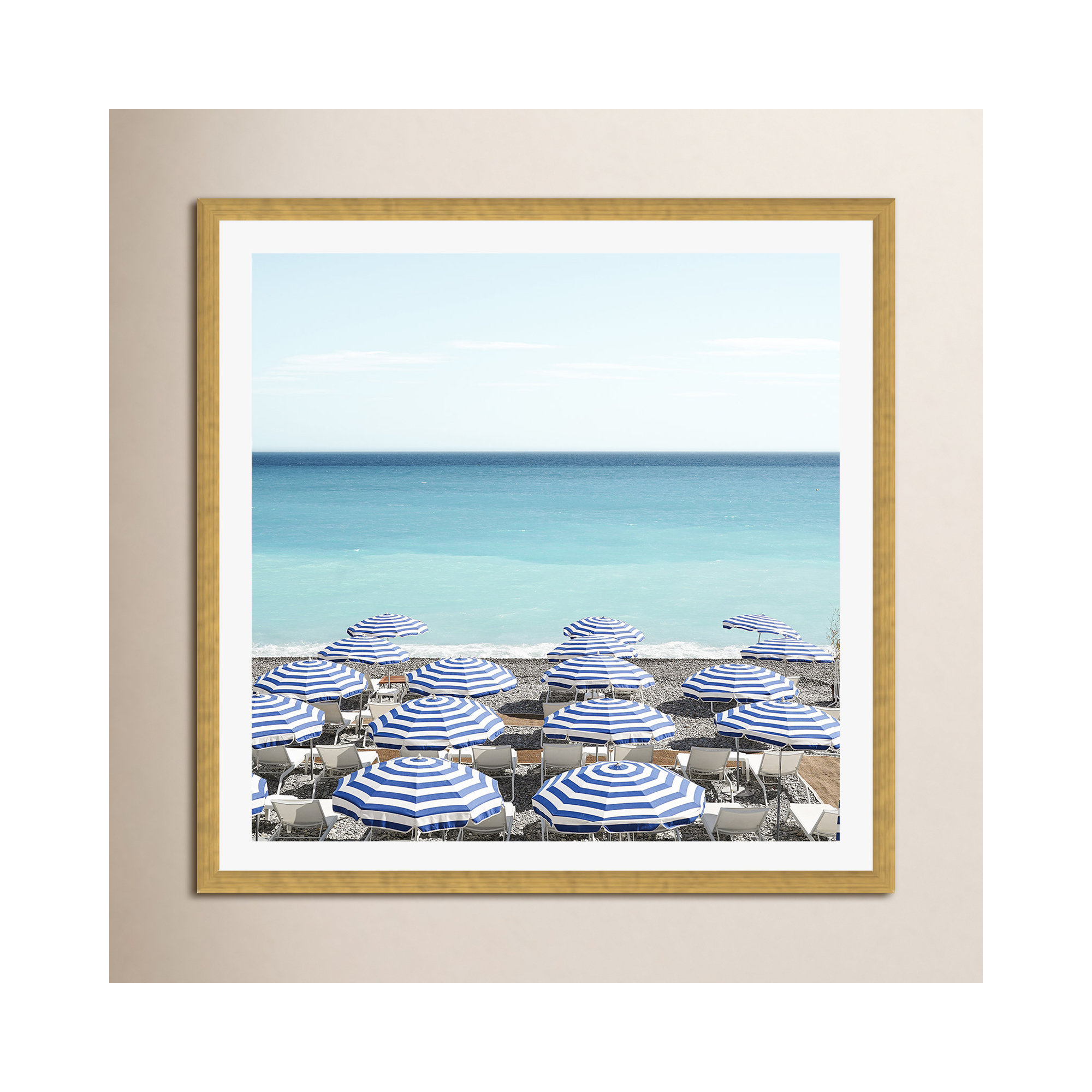 Blue Beach Umbrellas Photo by Henrike Schenk, Yes, 30" H x 30" W x 0.75" D, Gold Framed Paper