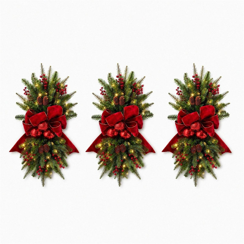 Décoration de Noël artificielle pré-illuminée en forme de larme (3 pièces) pour porte d'entrée, avec nœud rouge, baies et pommes de pin.