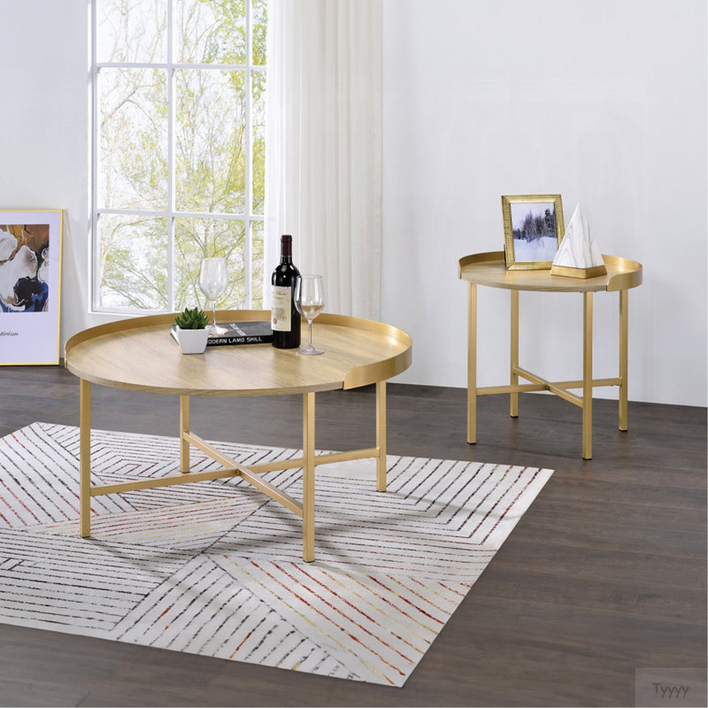 Table basse à plateau rond en chêne et or