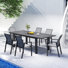 Ensemble de salle à manger de jardin Calliana avec table de salle à manger extensible et chaises empilables entièrement assemblées