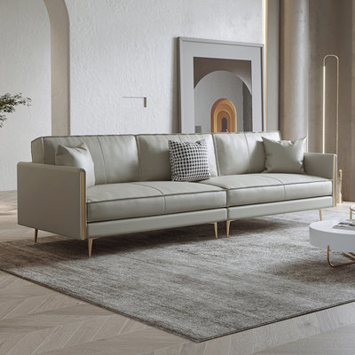 Canapé modulaire gris en similicuir