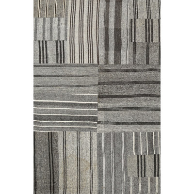 Tapis gris/zone noire contemporaine