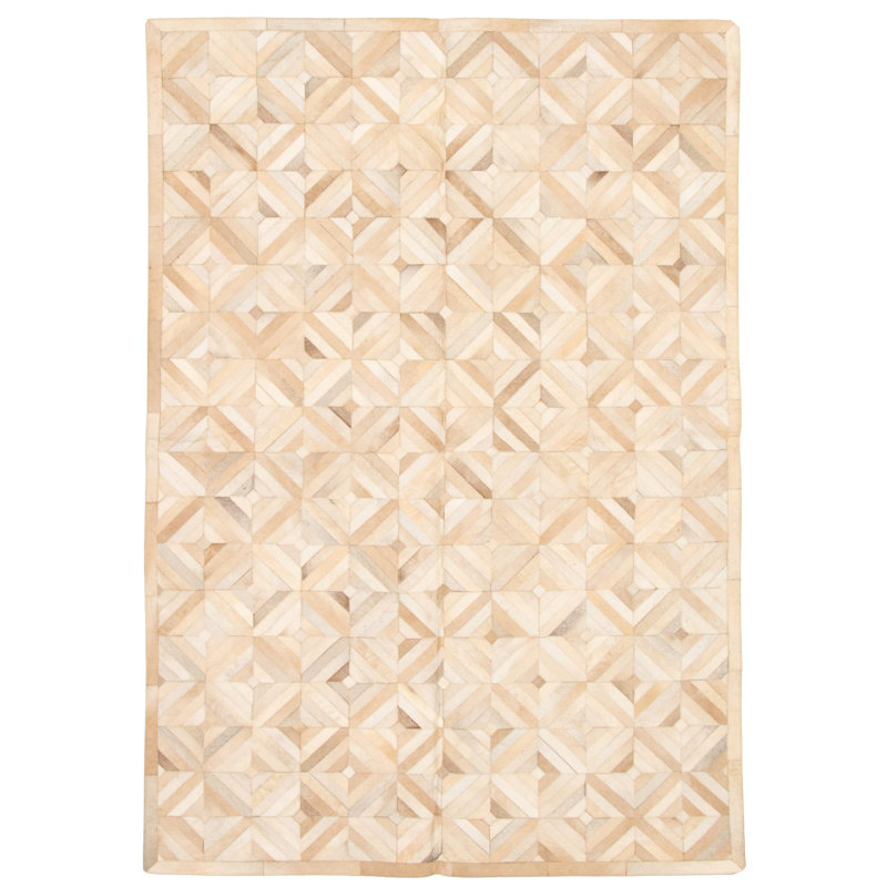 Tapis beige/ivoire vache fait main Choe