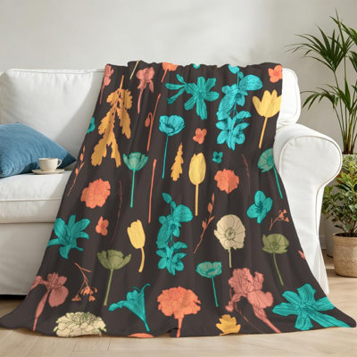 Jeté en molleton de flanelle orange ultra doux, imprimé floral rétro coloré sur une face