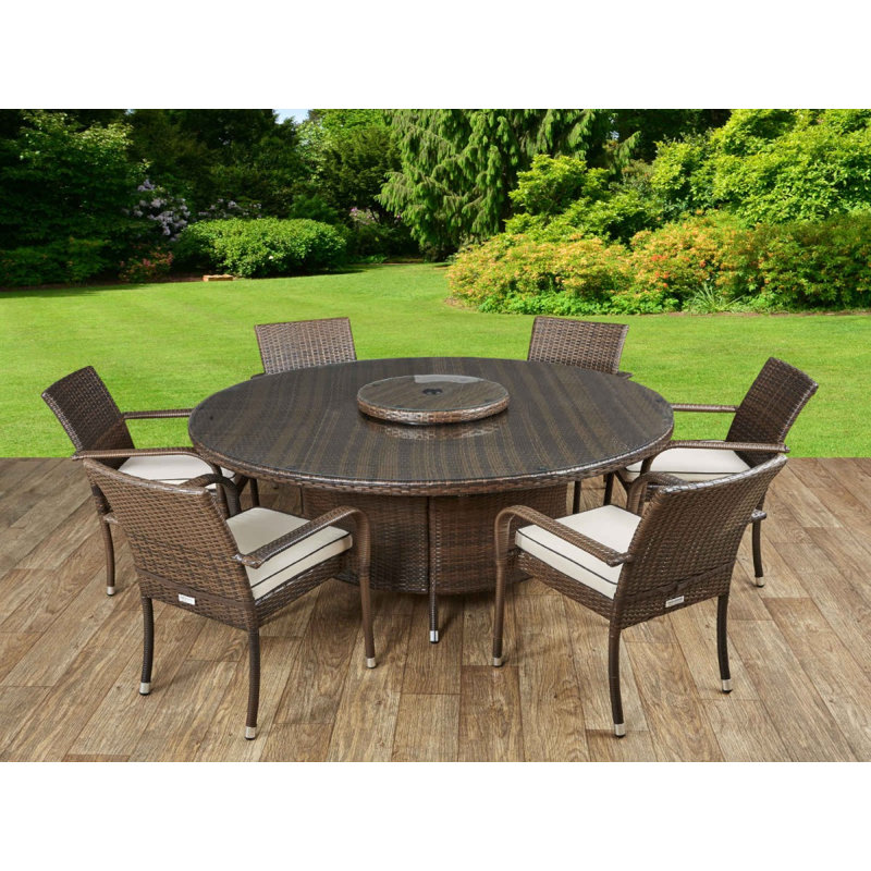 Kiska 6 - Person Patio Dining Set with Round Table , Cushions Included, Chocolate/Cream