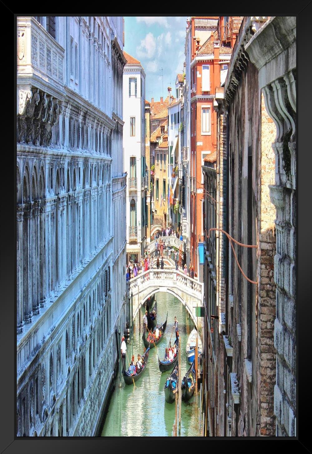 https://assets.wfcdn.com/im/19936404/compr-r85/1652/165225779/gondalos-in-a-traffic-jam-in-venice-italy-photo-art-print-black-wood-framed-poster-14x20-framed-on-paper-print.jpg