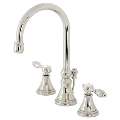 Kingston Brass Tudor Two-Handle 3-Hole Deck Mount Widespread Bathroom Faucet with Brass Pop-Up Drain