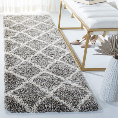 Tapis géométrique ivoire / brun