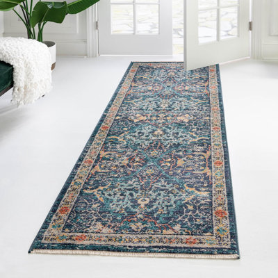 Tapis bleu marine à motif floral Alkire