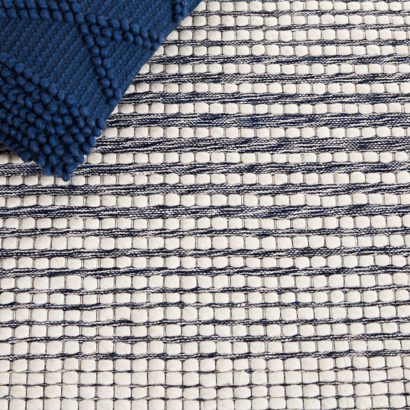 Ivory and Navy Hand Woven Wool 5'x8' Area Rug