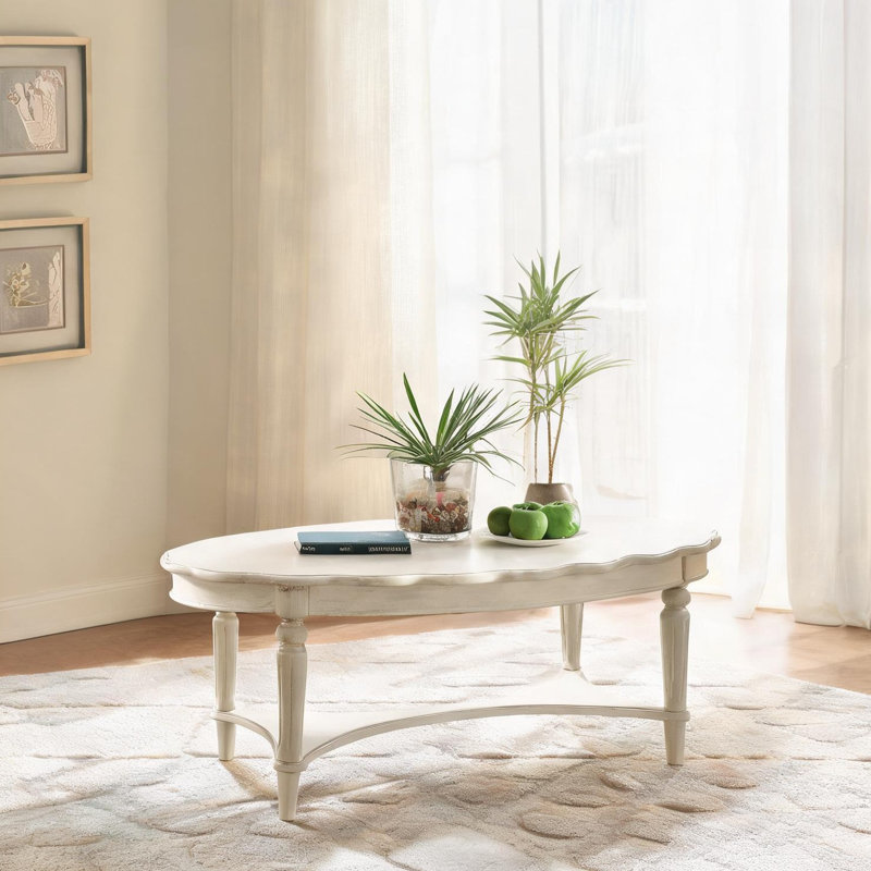 Table basse ovale en bois massif beige doux d'inspiration française avec tablette ouverte, 28 po x 50 po