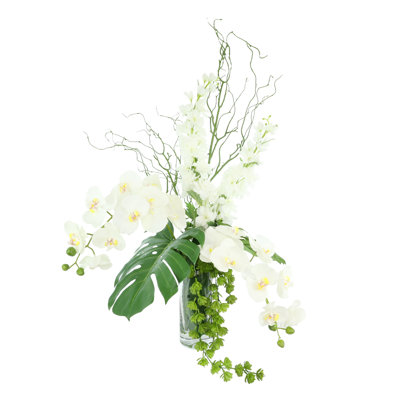 Tropical Centerpiece with Orchids and Monstera Leaves