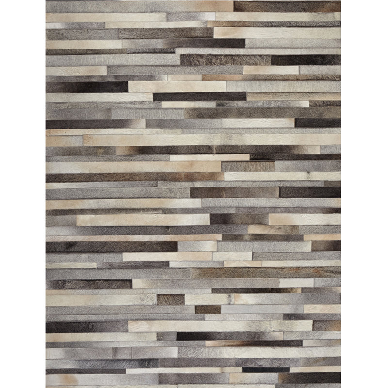 Sixt Hand Woven Cowhide Abstract Area Rug