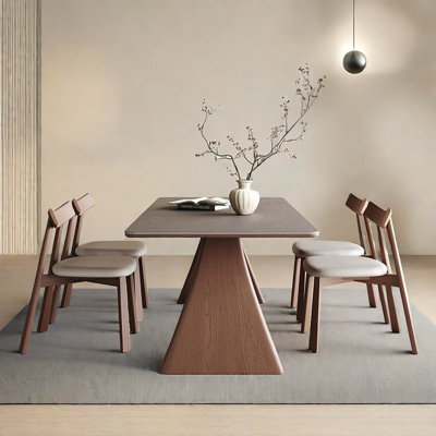 Simple dining table and chair set in walnut color.