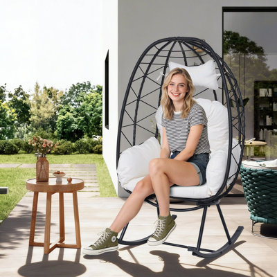 Fauteuil à bascule intérieur et extérieur en forme d'œuf, chaise longue cocon en rotin et osier d'une capacité de 330 lb avec coussin et coussin épais, chaise berçante simple pliable pour patio, balcon, chambre à coucher, salon