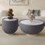 Table basse moderne en cuir clair avec dessus en marbre