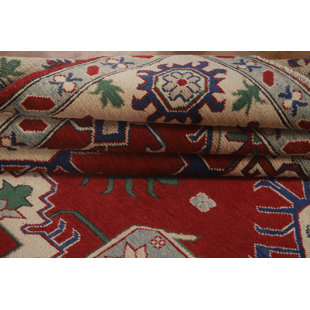 Tapis rouge à motif oriental Kazak