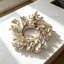 Couronne de bougies en buis artificiel couleur or champagne (lot de 6), style glamour, pour décorer une table ou un mur en toute saison.
